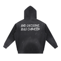 black oversized hoodie with back text bad decisions build character minimalist streetwear
