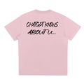 pink oversized graphic t shirt with text minimalist streetwear
